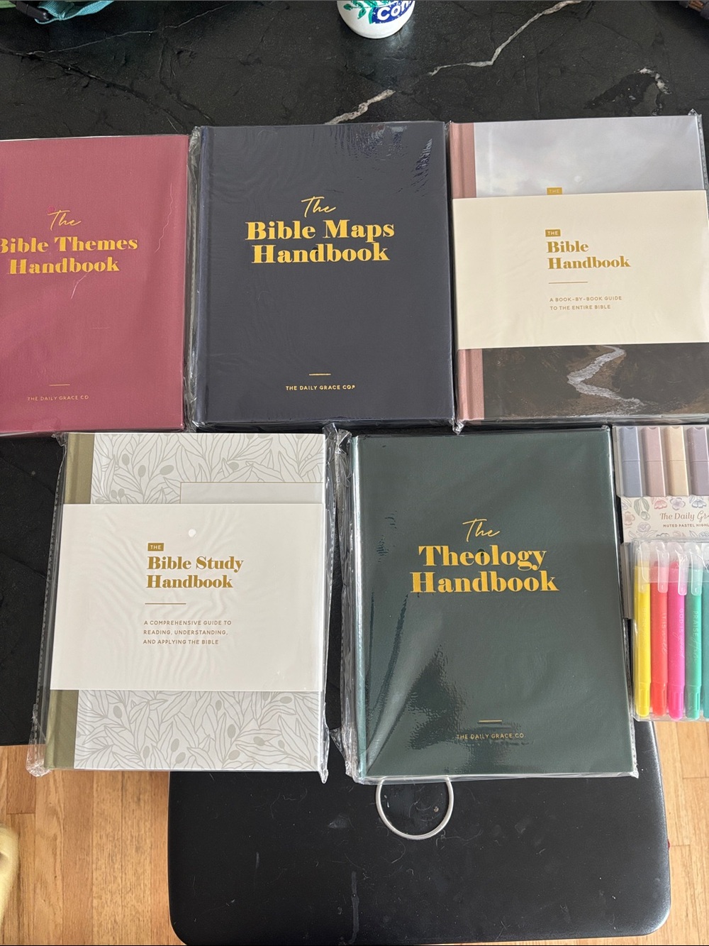 The daily grace books. The Theology Handbook • hardcover highlighters included